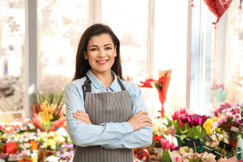 Beautiful,Female,Owner,In,Flower,Shop
